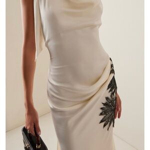 Elegant Cream Dress with Black Embroidery